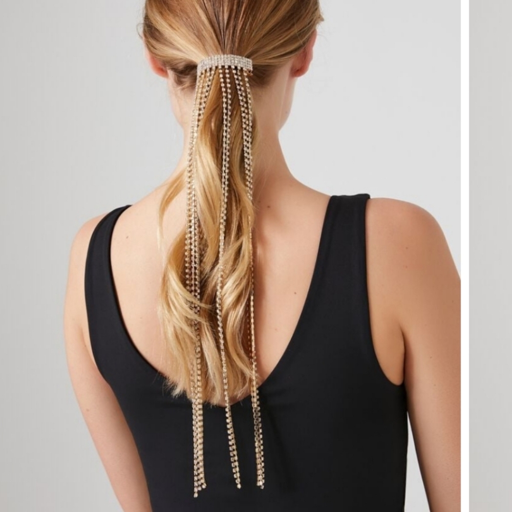 Diamond Jeweled ( faux ) gold hair clip accessory.